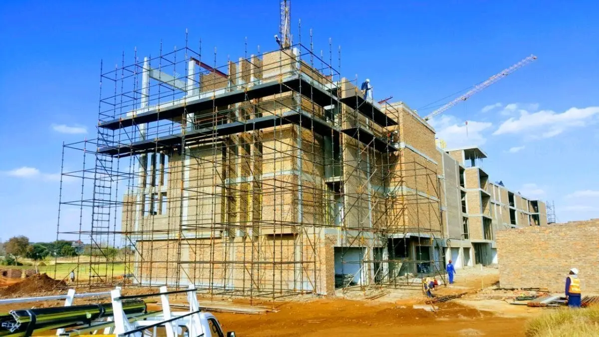Multi-storey building under construction with scaffolding